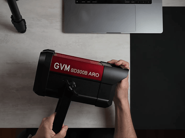 Amaran 300x vs GVM SD300B AIO comparison - The GVM SD300B AIO's integrated All-in-One design eliminates the external power brick required by the Amaran 300x, offering greater portability for solo creators.